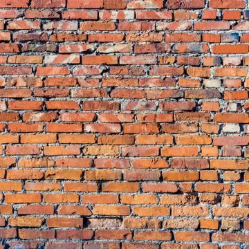 Background of red brick wall pattern texture. Stock Photos