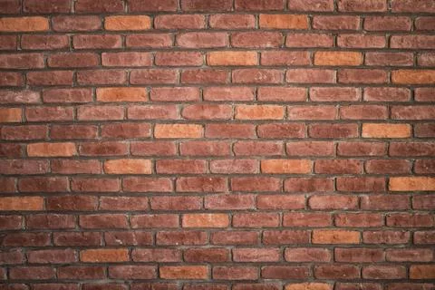 Background of red brick wall pattern texture. Great for graffiti inscriptions Stock Photos