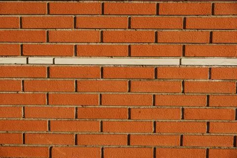 Background of red brick wall pattern texture. Great for graffiti inscriptions Stock Photos