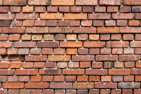 Background of red brick wall pattern texture. Stock Photos