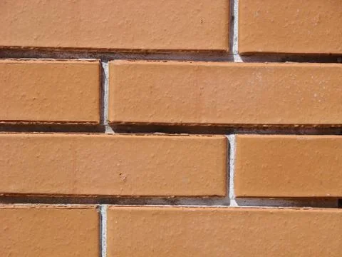 Background of red brick wall pattern texture. Great for graffiti inscriptions Stock Photos