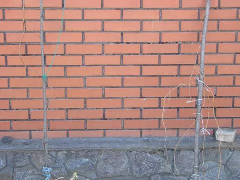 Background of red brick wall pattern texture. Great for graffiti inscriptions Stock Photos