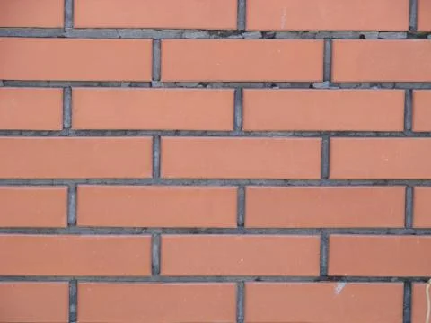 Background of red brick wall pattern texture. Great for graffiti inscriptions Stock Photos