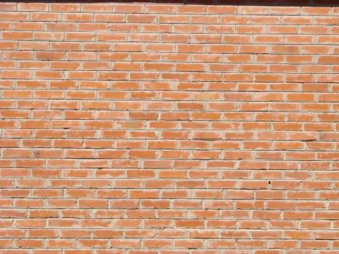 Background of red brick wall pattern texture. Great for graffiti inscriptions Stock Photos