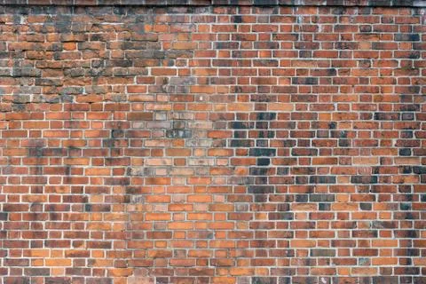 Background of red brick wall pattern texture. Stock Photos