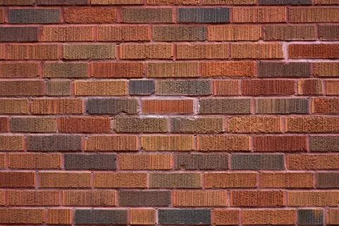 Background of red brick wall pattern texture. Great for graffiti inscriptions Stock Photos