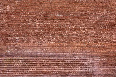 Background of red brick wall pattern texture. Great for graffiti inscriptions Stock Photos