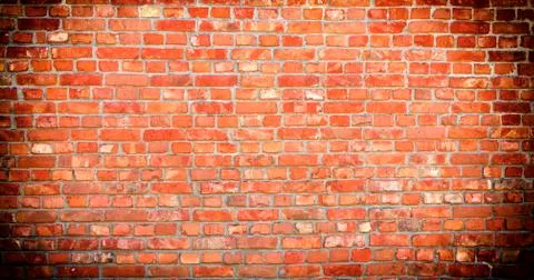 Background of red brick wall pattern texture Stock Photos
