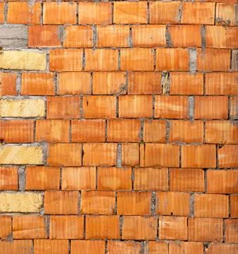 Background of red brick wall pattern texture. Great for graffiti inscriptions Stock Photos