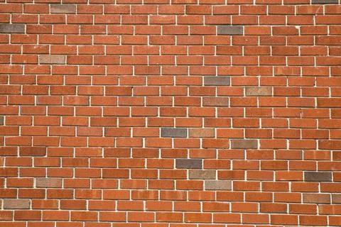 Background of red brick wall pattern texture. Stock Photos