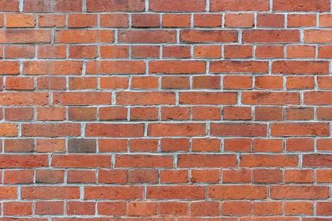 Background of red brick wall pattern texture. Stock Photos