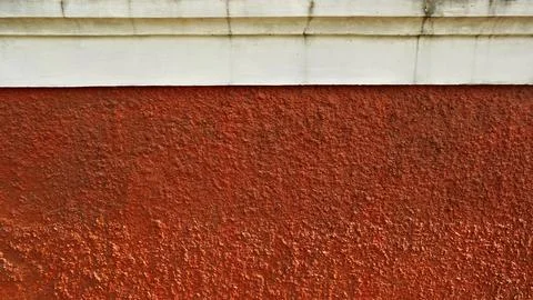 Background red cement rouh plester on the wall Stock Photos