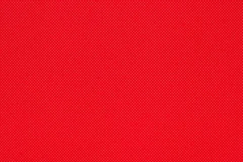 Background from red color texture of canvas non-woven fabric material in small Foto stock