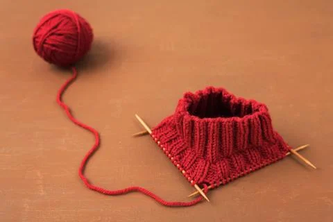Background with red knitting Stock Photos