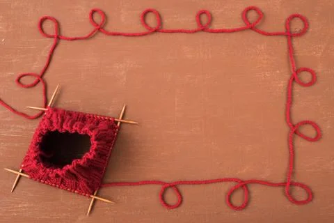 Background with red knitting Stock Photos
