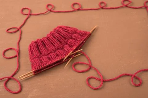 Background with red knitting Stock-Fotos