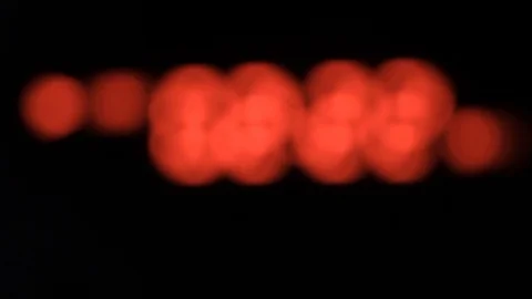 Background of red numbers that are out of focus. Counter with blurry numbers. Stock Footage 127309471