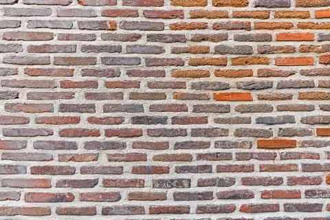 Background from a red rugged brickwall Photos