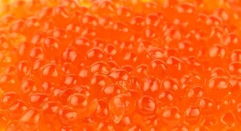 Background of red salmon caviar close up Background pattern of salmon fish... Foto stock