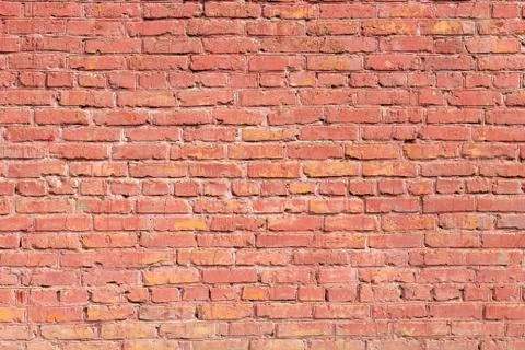 Background red wall of painted brick Stock Photos