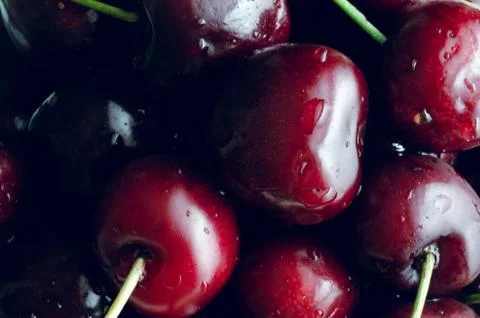 Background of ripe cherries. Macro concept. Stock Photos