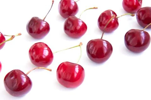 Background of ripe cherries on a white background Stock Photos