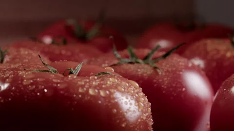 Background of ripe tomatoes lying on the table close-up. Stock Footage 267631465