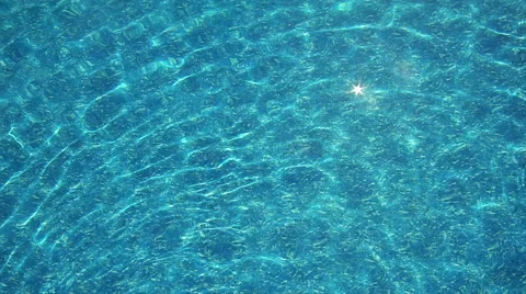 Background of rippled pattern of clean water in swimming pool Stock Footage 68324208