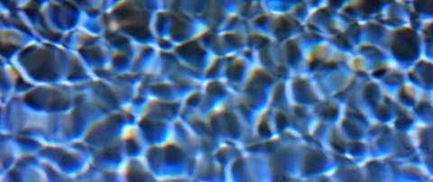 Background of rippled pattern of clean water in a blue swimming pool Stock Footage 87837891