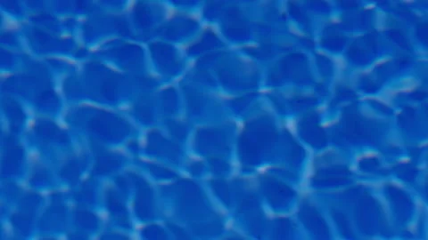 Background of rippled pattern of clean water in a blue swimming pool Stock Footage 225819493