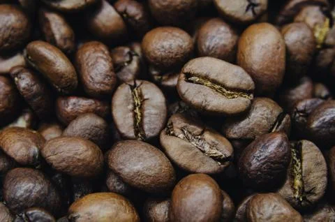 Background. roasted coffee beans, closeup. copy space Stock Photos