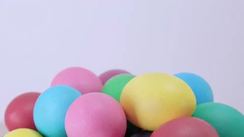 Background of rotating easter colorful chicken eggs, copy space Stock Footage 171515544