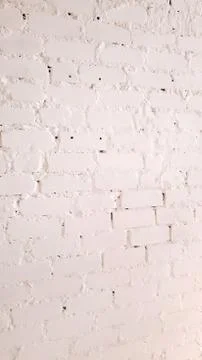 Background rough brick wall painted with white paint Stock Photos