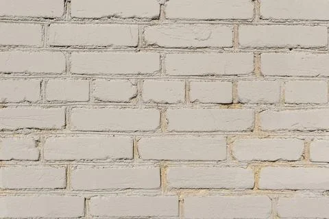 Background rough brick wall painted with white paint. Stock Photos