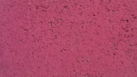 Background. Rough, porouse, painted wall texture,  pink color.  Stock Photos