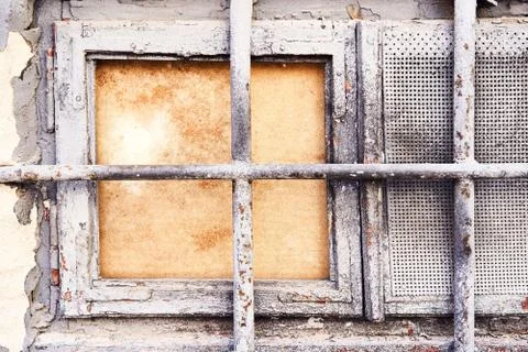 Background rust texture. Hard old painted grey wall with wooden window and Stock Photos