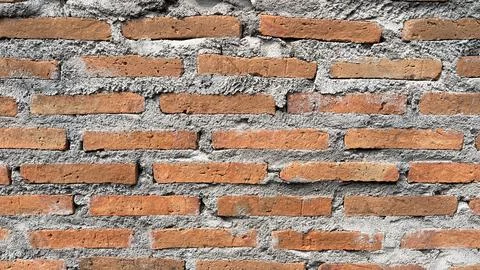 Background of a rustic red brick wall texture Stock Photos