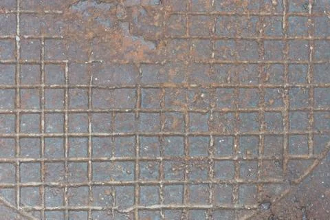 Background from rusty cast iron with the checkered relief drawing Stock Photos
