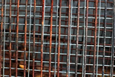 Background with rusty grid. Construction and industrial theme. Stock Photos