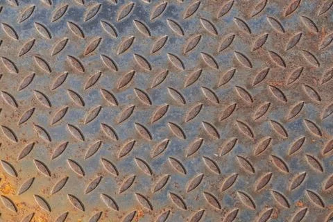 Background of rusty metal material texture with a pattern, used. distressed e Stock Photos