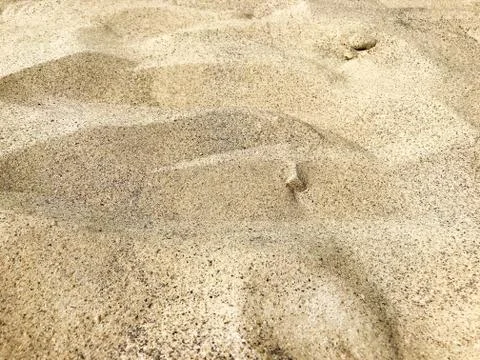 Background - sand on the beach. Stock Photos
