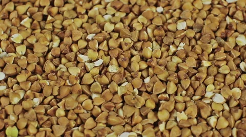 Background from the scattered buckwheat, close up rotation Stock Footage 53789181