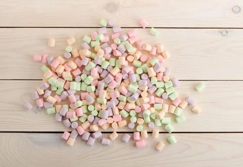 Background from the scattered candy marshmallows Stock Photos