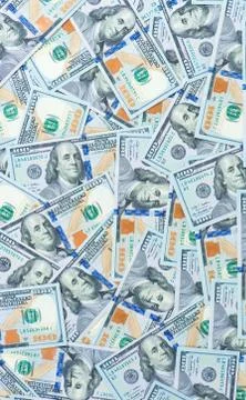 Background from scattered dollar banknotes as abstract seamless. Stock Photos