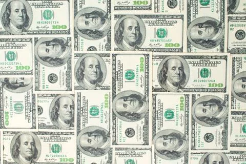 Background from scattered dollar banknotes as abstract seamless. Stock Photos