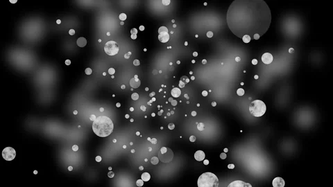 Background scattered glowing circular bokeh and textured moon-like spheres .. Stock Footage 329938325