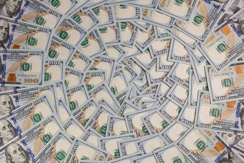 Background of Scattered One Hundred US Dollar Bills Representing Wealth and.. Stock Photos