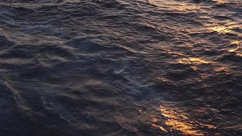 Background of sea water when it sunset - slow motion. Stock Footage 77365814
