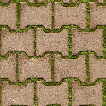 Background seamless texture of green grass sprouted between bricks of Stock Photos