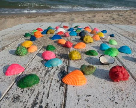 Background with seashells, beach and waves Stock Photos